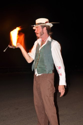 Man playing with fire poi.